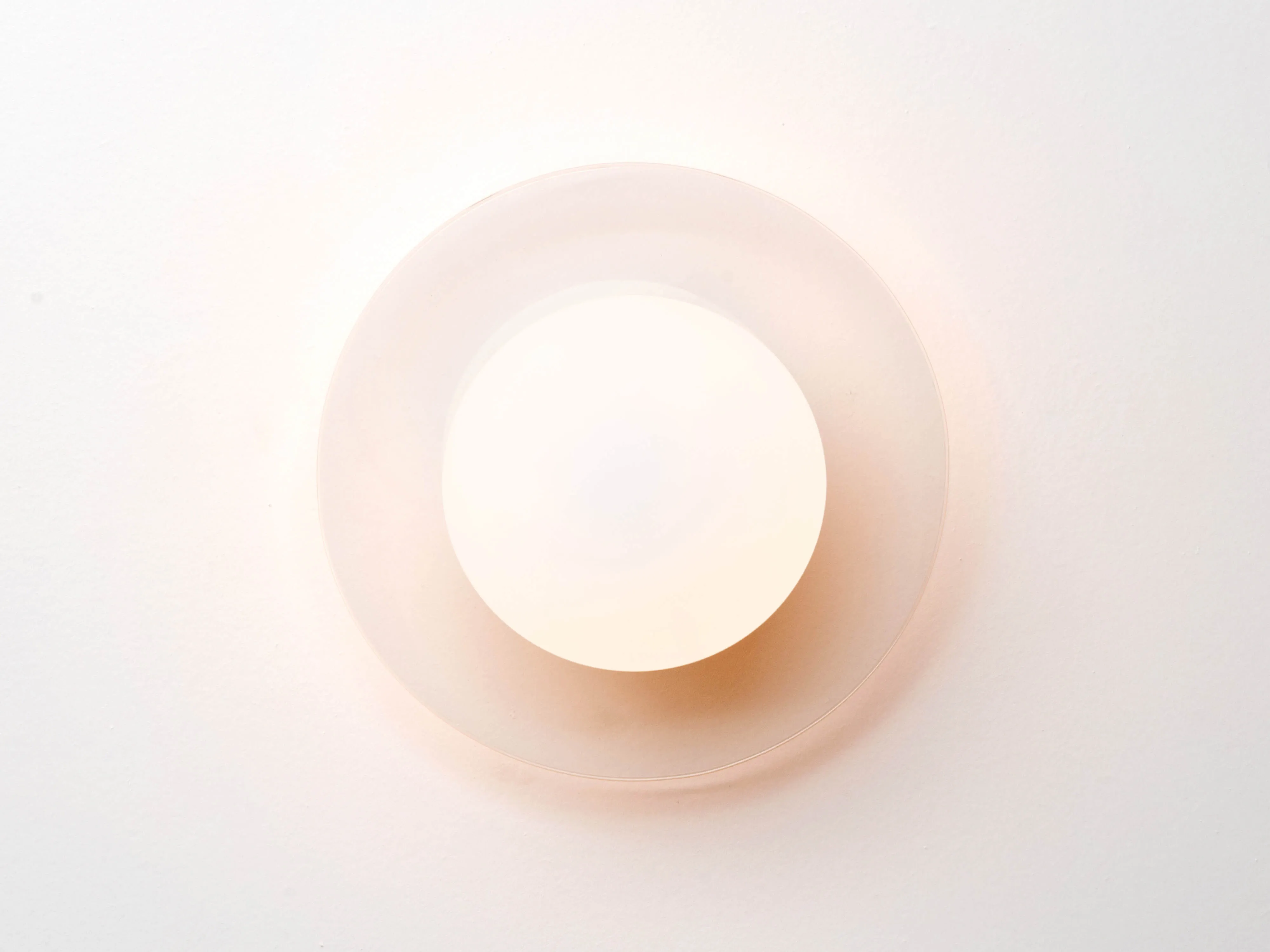 Glass opal disk wall light